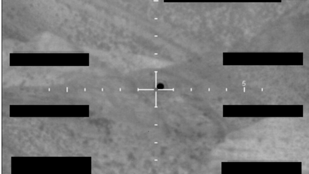 An FBI-collected UAP photograph with bureau markings and a target reticle