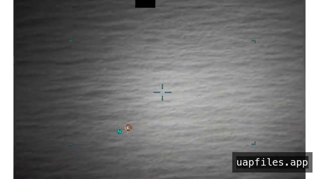 DOW-UAP-PR029, an infrared display over open water with a tracking reticle and a small object